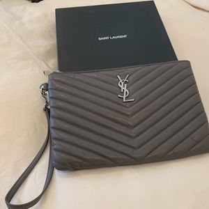 100% Authentic Saint Laurent Leather zip clutch